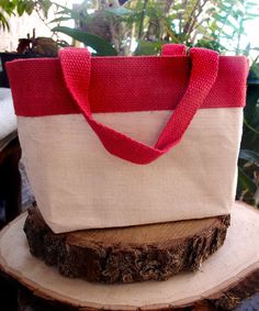 Introducing our tote bag, a distinctive blend of cotton and jute that exudes a high-end design. Enhanced with an inner laminate lining for a perfect touch of sophistication. Dimensions: 11 1/2"W x 7 1/2"H x 4 1/2"D Small Jute Bags, Burlap Napkins, Colored Burlap, Burlap Tote Bags, Lace Bag, Burlap Tote, Jute Tote Bags, Burlap Bags, Jute Totes