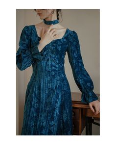 A beautiful velvet dress in shiny peacock blue. The faintly drawn flower pattern looks like a fantastic flower submerged in the deep blue ocean. A square neckline that beautifully shows off your neck. The high waist position creates a beautiful silhouette. 
 
 Size 
 
 S size 
 
 Length: 115cm 
 Shoulder width: 33cm 
 Bust: 84cm 
 Waist: 68cm 
 Sleeve length: 60cm 
 
 M size 
 
 Length: 116cm 
 Shoulder width: 34cm 
 Bust: 88cm 
 Waist: 72cm 
 Sleeve length: 61cm 
 
 L size 
 
 Length: 117cm 
 S Fitted Velvet Dress With Square Neck, Blue Fitted Velvet Dress, Fitted Blue Velvet Dress, Deep Blue Ocean, Floral Velvet Dress, Belle Silhouette, In The Deep, Peacock Blue, Square Necklines