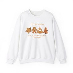 This cozy sweater features adorable gingerbread cookies and a joyful message that celebrates the sweetness of the holiday season. Perfect for snuggling up with a cup of hot cocoa or spreading holiday cheer, this crewneck is a must-have for cookie lovers and anyone who adores the warmth of winter festivities. Whether you're at a holiday party or enjoying a quiet night in, this stylish and comfy crewneck will make every moment sweeter!" Product Features - Medium-heavy fabric blend of 50% cotton and 50% polyester for cozy feel - Classic fit and crew neckline for a comfy wearing experience - Double-needle stitching for added durability - Ethically grown US cotton and OEKO-TEX-certified dyes for sustainability - Ribbed knit collar with seam for shape retention Care instructions - Machine wash: Sugar Rush, Cozy Sweaters, Ribbed Knit, Halloween Shopping, Sweat Shirt, Gender Neutral, Crew Neck, Sweatshirts Hoodie, Bathing Beauties