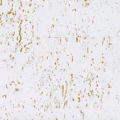 an old white and gold painted wall with some rust on it's surface,