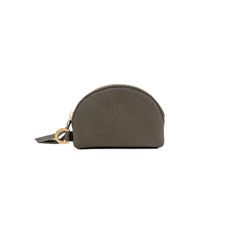 The perfect addition to any TAH Bag, the Half Moon Coin Purse is the perfect catch-all for your cash, cards, and small essentials! Attach it to your keys with the D-ring that is compatible with most of our styles! Handcrafted in full-grain leather and solid brass hardware with zipper closure. Ways to Wear Fits cards, cash, coins, and your favorite chapstick Attach to any TAH Bag with a tassel or key link Details Brass D-Ring Zipper closure Fully Lined Solid brass hardware Full-grain leather Desi Versatile Everyday Coin Purse With Key Clip, Modern Coin Purse With Key Clip For Travel, Modern Travel Coin Purse With Key Clip, Modern Coin Purse With Key Clip, Versatile Coin Purse With Key Clip, Versatile Coin Purse With Key Clip For Daily Use, Modern Coin Purse With Key Clip For Daily Use, Blush And Grey, Leather Artisan