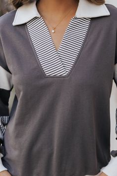 Elevate your casual wardrobe with our Charcoal Color Block French Terry Sweatshirt! *Pre Order - Expected Arrival Date: Week of August 26th Crafted from soft and cozy French Terry fabric, this long sleeve sweatshirt features a stylish color block design with a striped pattern. The collared v neckline adds a touch of sophistication to this must-have piece. Made with 80% cotton and 20% polyester for ultimate comfort and quality. Pair it with jeans and comfy sneakers for the perfect lived-in outfit! Fabric Outfits, Sorority Rush Outfits, Rush Outfits, Comfy Sneakers, Gameday Dress, Loungewear Dresses, Casual White Dress, Color Block Design, Game Dresses