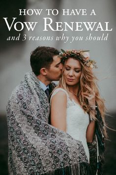 a man and woman embracing each other with a blanket over their heads in front of them