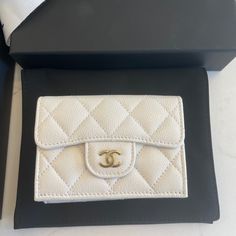 Brand New Chanel Classic Small Wallet Coco Mark Trifold Caviar Skin White. Come With Dust Bag, Box, Bag Material : Caviar Leather Color : White Chanel Small Flap Wallet, Luxury Coin Purse With Card Slots In Pouch Shape, Luxury Coin Purse With Card Slots, Luxury Coin Purse With Coin Pocket As Gift, Luxury Coin Purse With Coin Pocket, Luxury Compact Travel Coin Purse, Designer Compact Coin Purse For Travel, Luxury Pouch Clutch With Interior Card Slots, Luxury Bifold Coin Purse With Coin Pocket