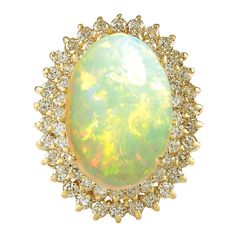 Stamped: 14K Yellow Gold Total Ring Weight: 10.5 Grams Total Natural Opal Weight is 8.78 Carat (Measures: 18.00x13.00 mm) Color: Multicolor Total Natural Diamond Weight is 1.60 Carat Color: F-G, Clarity: VS2-SI1 Face Measures: 26.55x21.25 mm Sku: [702382W] Yellow Gold Opal Ring, Sapphire Cocktail Ring, Opal Diamond Ring, Spinel Ring, Yellow Gold Diamond Ring, Opal Ring Gold, Diamond Cocktail Rings, La Face, Creative Jewelry