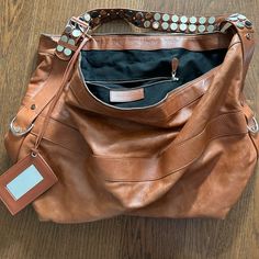 Like New Gorgeous Color Brownish Rust Soft Leather Unisex - Can Be Weekender 2 Missing Flat Silver Grommets - But Never Worn ! With All Authentic Papers And Mirror Large Designer Shoulder Bag With Handle Drop, Large Brown Designer Shoulder Bag, Designer Large Brown Satchel, Large Designer Satchel For Everyday Use, Large Designer Satchel, Bags Balenciaga, Leather Travel Bag, Doctor Bag, Balenciaga Bag