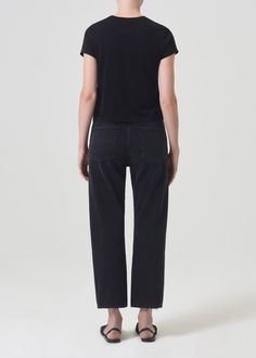 Our best-selling 90's Jean with the much-requested cropped inseam. This decade inspired mid-rise is designed to sit relaxed at the waist with an easy fit through the hips into a classic, loose straight leg. Style back to anything and everything. Crafted in our signature Organic Cotton, this pair will only get softer with each wear.For the full-length version, shop the 90's Jeans. This fit is intended to be relaxed. Size down for a higher, closer fit. Looks Like: Washed black with a finished but 90s Jeans, Product Development, New Wardrobe, Stretch Denim, Mid Rise, Full Length, Straight Leg, Organic Cotton, Wardrobe