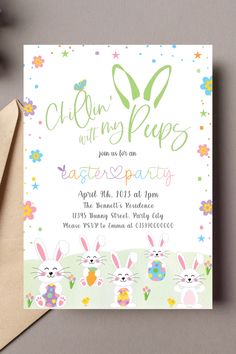 an easter party card with bunny ears and flowers on it, next to some envelopes