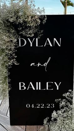 a black and white sign that says, dylan and bailey on it's side