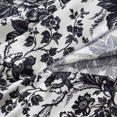 black and white fabric with flowers on it