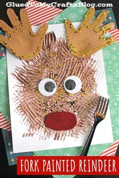 a paper plate with a reindeer face on it and a fork in front of it