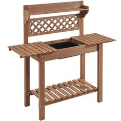 a wooden bench with a planter on the bottom and shelf below it that holds a potted plant