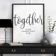 a black and white poster with the words together is our favorite place to be on it