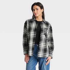 This Oversized Flannel Long-Sleeve Collared Button-Down Shirt from Universal Thread™ makes a versatile addition to your wardrobe. Made from midweight cotton, this collared shirt features a front button placket, long sleeves with buttoned cuffs, a patch pocket on the chest and a box-pleat back yoke for classic touches. The oversized fit and shirttail hemline complete the design, allowing you to wear it tucked in, untucked, layered open and unbuttoned, or with rolled-up sleeves. Universal Thread™: Long Sleeve Shirt Women, Oversized Flannel, Womens Long Sleeve Shirts, Collared Shirt, Universal Thread, Black Plaid, Shop Blouses, Shirt Women, Casual Fits