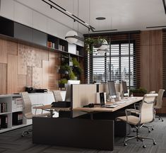 an office area with desks, chairs and bookshelves