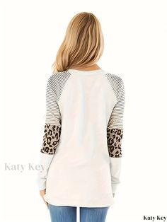 Katykey - Womens Snowman Leopard Print Crew Neck Long Sleeve T-shirt - Stylish and Casual Winter Apparel White Raglan Sleeve Top For Fall, Casual Winter Tops With Cat Print, White Raglan Sleeve T-shirt For Fall, White Raglan Sleeve Top With Graphic Print, White Graphic Print Raglan Sleeve Top, Casual Long Sleeve Hoodie With Cat Print, Casual Long Sleeve Sweatshirt With Cat Print, Casual Leopard Print Crew Neck T-shirt, Winter Apparel