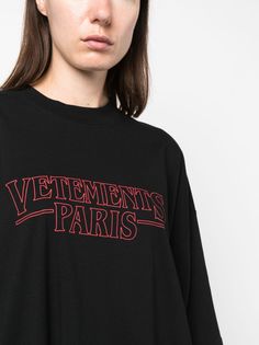 logo-print cotton T-shirt from VETEMENTS featuring black, cotton, logo print to the front, crew neck, oversize arms, drop shoulder, short sleeves, straight hem and thigh-length. Size Info STANDARD Color Detail Black Made In Portugal Material Cotton 100% Season One Fall-Winter Season Two Fall-Winter Product t-shirts and polos Brand Vetements Size And Fit This piece fits true to size. We recommend you get your regular sizeModel is 1,75m / 5ft 8in wearing size S Oversized Logo Tops, Oversized Black T-shirt With Logo, Oversized Black Top With Logo Lettering, Oversized Logo Detail Tops For Streetwear, Oversized Black Logo Top, Oversized Tops With Logo Lettering For Streetwear, Oversized Logo Tops For Streetwear, Trench Dress, Trench Jacket