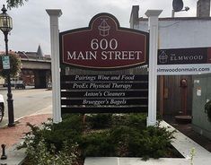 a sign for the main street winery and food