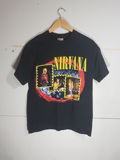 Killer Nirvana t shirt!! Dated 1997  In excellent shape!! Relive the 90s in this rad shirt!!  Size: fits like modern men's S or woman's M check additional measurements Pit to Pit     18.5" Length        27.0" 90s Band Logo T-shirt For Streetwear, Grunge Band Logo T-shirt For Music Festivals, Band Merch T-shirt For Fan Merchandise, 90s Band Logo T-shirt For Music Festivals, Vintage T-shirt With Graffiti Print For Concert, Vintage Graffiti Print T-shirt For Concert, Grunge Fan Merchandise T-shirt For Festivals, 90s Crew Neck T-shirt For Alternative Fashion, Grunge Graffiti Print T-shirt For Fans