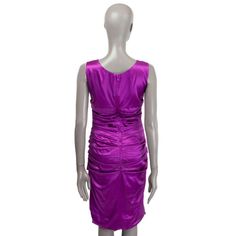 For Sale on 1stDibs - Dolce & Gabbana sleeveless satin ruched dress in orchid purple silk (96%) and elastane (4%) with a round neck. Closes on the back with a zipper. Lined Elegant Ruched Sleeveless Dress, Ruched Back Silk Dress, Silk Dresses With Ruched Sides, Ruched Sleeveless Knee-length Evening Dress, Formal Ruched Sleeveless Dress, Knee-length Ruched Sleeveless Evening Dress, Ruched Sleeveless Knee-length Dress For Evening, Ruched Sleeveless Dress For Formal Occasions, Silk Draped Dress With Ruched Back