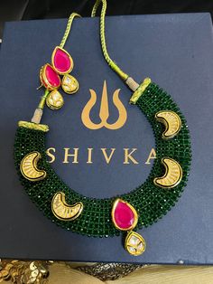 One of our favourite picks for the wedding season 2022♥️ The gorgeous necklace is beautifully handcrafted by our skilled Indian craftsmen in multicoloured Kundan stones, beads, and gold plated. The mesh beaded base adds a perfect charm to the stunning choker necklace. The beautiful kundan earrings add to the traditional ethnicity of the piece. Material: Brass, kundanStones, Brooches, Gold Plating Length of earrings : 4 cms Width of earrings : 1.7 cms Light Weight necklace. The necklace and earri Luxury Festive Jewelry Sets, Formal Temple Jewelry Kundan Necklace With Matching Earrings, Exquisite Hand-set Jewelry Sets For Festive Occasions, Exquisite Hand-set Jewelry For Festive Occasions, Exquisite Handmade Festive Jewelry, Formal Fusion Jewelry Sets With Intricate Design, Formal Fusion Bridal Necklace With Elegant Design, Elegant Handmade Kundan Necklace Gift, Temple Jewelry Sets With Elegant Design