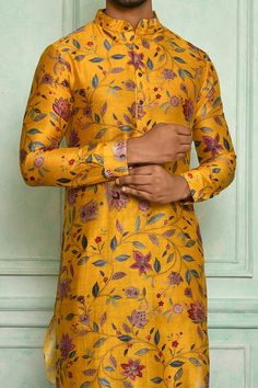 Yellow chanderi kurta with floral printed motifs and front buttons. Paired with antique churidar.
Component: 2
Pattern: Printed
Type Of Work: Floral
Neckline: Mandarin
Sleeve Type: Full
Fabric: Chanderi, Cotton
Color: Yellow
Other Details: 
Front buttons
Floral motifs
Occasion: Mehendi and Puja - Aza Fashions Bollywood Style Straight Kurta With Kalamkari Print, Designer Kalamkari Print Churidar For Diwali, Bollywood Style Kalamkari Print Kurta, Festive Straight Kurta With Kalamkari Print, Traditional Churidar With Kalamkari Print For Designer Wear, Festive Salwar Kameez With Kalamkari Print, Festive Kalamkari Salwar Kameez With Straight Kurta, Designer Kalamkari Print Churidar For Navratri, Straight Kurta With Printed Motifs For Transitional Season