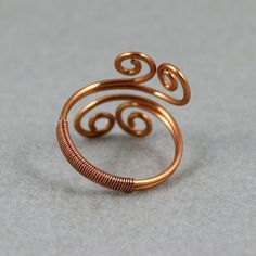 "This unique ring is handmade using copper. Free US shipping. Customers who purchased this item said: \"I'm addicted to the beautiful unique pieces from this seller. I haven't gotten anything from them I would send back. They are gorgeous. Now I have to make another order for another treasure I found. My favorite go to jewelry. \" ;-) My contact number: 626-379-1904. Please contact me if you would like to order multiples or customize a design for your special event, I will be pleased to give you Rose Gold Copper Open Ring, Rose Gold Open Ring In Copper, Rose Gold Hand Wrapped Ring As Gift, Hand Wrapped Rose Gold Ring Gift, Handmade Rose Gold Toe Ring, Unique Handmade Copper Rings, Handmade Elegant Copper Rings, Handmade Rose Gold Open Ring, Adjustable Copper Rings For Wedding