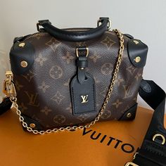 Elevate Your Fashion Game With This Stunning Louis Vuitton Petite Malle Souple Monogram Bag. Crafted With Premium Leather, This Crossbody Bag Is Perfect For Women Who Appreciate Style And Functionality. Its Monogram Pattern Adds A Touch Of Elegance That Complements Any Outfit, While The Brown Exterior Color Exudes Sophistication. This Designer Bag Is A Must-Have For Fashion Enthusiasts Who Want To Make A Statement. With Its Spacious Interior, It Can Easily Hold All Your Essentials While Keeping Louis Vuitton Petite Malle Souple, Louis Vuitton Petite Malle, Louis Vuitton Handbags Outlet, Monogram Pattern, Handbag Outlet, Monogram Bag, Designer Bag, Vuitton Bag, Louis Vuitton Handbags