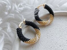 💖 These handmade black and gold seed bead beaded hoop earrings are the perfect accessory for any occasion. Whether you're looking for a unique gift for your sister-in-law's birthday or any jewelry lover in your life, these statement earrings are sure to impress. Surprise her with these eye-catching earrings that are sure to make a stylish statement wherever she goes. Plus, they are ready to ship, so you can enjoy them in no time! Add a touch of glam to any outfit with these unique chunky hoop e Handmade Black Beaded Small Hoop Earrings, Small Black Hoop Earrings For Jewelry Making, Black Beaded Round Hoop Earrings, Black Beaded Hoop Earrings, Black Beaded Small Hoop Earrings As Gift, Handmade Black Hoop Jewelry, Adjustable Hoop Earrings With Black Beads As A Gift, Black Minimalist Handmade Hoop Earrings, Adjustable Black Beaded Hoop Earrings As Gift