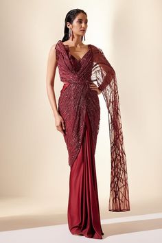 Wine draped saree gown with sequin, cutdana, bead embroidery in stripe pattern. - Aza Fashions Elegant Embroidered Draped Saree, Festive Embroidered Draped Saree, Traditional Embroidered Draped Saree, Bollywood Traditional Drape Embroidered Gown, Embroidered Fitted Draped Saree, Draped Saree Gown, Drape Gown, Saree Gown, Drape Saree