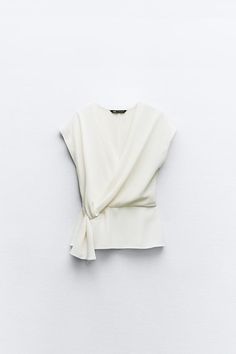 KNOTTED CREPE TOP - Ecru | ZARA United States Zara Tops 2023, Summer V-neck Twist Front Tops, Solid Color Chic Wrap Tops, Solid Color V-neck Faux Wrap Top, Chic White V-neck Wrap Top, Chic White Wrap Top, Chic Solid Surplice Neckline Tops, Fall Faux Wrap Blouse With Surplice Neckline, Chic Surplice Neckline Tops