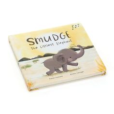 an elephant that is standing in front of a book with the words smudge on it