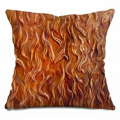 an orange pillow with wavy lines on it