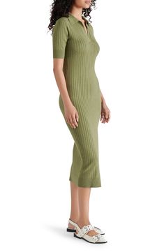 A ribbed knit adds texture to this slim-fitting sweater-dress designed with a jaunty collar and a leggy slit hem. 45 1/2" length (size Medium) Slips on over head Johnny collar Short sleeves Front slit Unlined 73% viscose, 27% polyamide Machine wash, dry flat Imported Midi Sweater Dress, Johnny Collar, Midi Short Sleeve Dress, Mother Denim, Sweater Dress Midi, Pleated Midi Dress, Pattern Sweater, Knit Midi Dress, Collar Dress