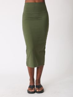 Handcrafted in Los Angeles from our signature cotton spandex, the Simone skirt is form fitting, flattering, and majorly versatile. In the coolest hunter green, we love the Simone paired with our Faye tee. Fabric: 90% Cotton, 10% Spandex. Color-way: Hunter. Model is 5'9" and wearing size small. Machine wash. Tumble dry on low. Made in the USA. Fitted Green Cotton Bottoms, Green Cotton Fall Skirt, Fitted Olive Cotton Bottoms, Fall Green Cotton Skirt, Fitted Khaki Cotton Skirt, Fitted Green Elastane Skirt, Sweat Sets, Hunter S, Sweaters And Leggings