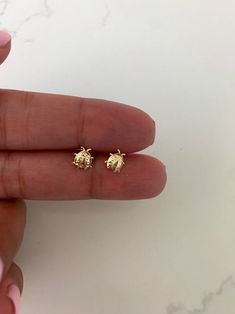 "14K Bezel Ladybug Earrings, Dainty Earrings, Women Earrings, Kid Earrings, Solid Gold Ladybugs, Gold Ladybugs, Gold Earrings ♦ Materials: 14kt Solid Gold, Stone: Cubic Zirconia ♦ Available colors: Clear Cubic Zirconia on Yellow Gold ♦ Closure: Screw Backs ♦ Earrings Measurements: 7x6 (LxW) Millimeters -------------------------------------------------- ♦ -------------------------------------------------- PRODUCTION TIMES Order processing time varies between 1-2 business days, we work on our piec Kid Earrings, Ladybug Earrings, Japanese Lunch, Gold Bar Earrings, Emerald Earrings Studs, Gold Bridal Earrings, Opal Earrings Stud, Gemstone Stud Earrings, Women Earrings