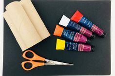 the supplies needed to make an art project include markers, glue, and paper bags