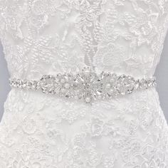 Beaded Wedding Belt, Beaded Belt Wedding, Beaded Wedding Dress Belt, Belts for Wedding Dress Add a touch of luxury to your bridal ensemble with our exquisite Beaded Wedding Belt. This elegant accessory defines your waistline and exudes glamour with its dazzling crystals and lustrous pearls. Whether you're opting for a simple dress or looking to elevate your bridal style, this modern bride-approved belt is the perfect choice. Embrace elegance on your special day. 💖 Details - Embellishment measures 33 inches long and 2 inches wide - Handmade with sparkling rhinestones, simulated pearls 💖 Packaging Each accessory is delicately packaged in our exclusive soft and luxe velvet bag, ensuring its pristine condition until your special day. 💖 Shipping This item is currently in stock, and will be s Pearl Wedding Dress Belt, Beaded Bridal Sash, Wedding Dress Sash Belt, Belt Wedding Dress, Bridal Sash Belt, Wedding Dress Sash, Light Blue Wedding, Wedding Belt, Wedding Dress Belt