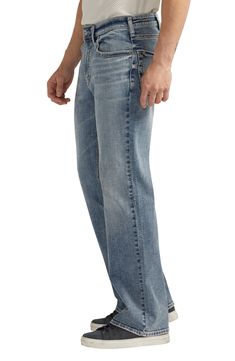 Made from faded stretch denim, these relaxed-fit jeans sit below the waist and are cut loose through the hips and thighs for that perfectly slouched look. 19" leg opening; 11" front rise Zip fly with button closure Five-pocket style 83% cotton, 15% polyester, 2% elastane Machine wash, tumble dry Imported Faded Straight Leg Rigid Denim Bottoms, Straight Leg Faded Rigid Denim Bottoms, Faded Rigid Denim Bottoms With Standard Cut Leg, Medium Wash Relaxed Fit Jeans, Relaxed Fit Medium Wash Jeans, Casual Faded Flare Jeans With Standard Cut Leg, Faded Relaxed Fit Bottoms With Five Pockets, Casual Washed Blue Flare Jeans With Standard Cut Leg, Casual Straight Washed Jeans