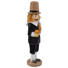 a wooden toy with a man in a top hat and coat on it's head