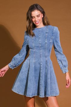 A washed denim mini dress with round neckline, long sleeve, skater skirt and back zipper closure Details: Self : 97% Cotton 3% Spandex Size & Fit - Model is 5`9" And Wearing Size Small- Measurements Taken From Size Small- Approx. Length: 34" Light Wash Long Sleeve Denim Mini Dress, Trendy Long Sleeve Light Wash Denim Dress, Trendy Light Wash Long Sleeve Denim Dress, Casual Medium Wash Denim Dress With Back Zipper, Trendy Mini Denim Dress With Back Zipper, Medium Wash Mini Dress For Fall, Fitted Long Sleeve Washed Denim Dress, Fitted Long Sleeve Washed Blue Dress, Trendy Long Sleeve Denim Blue Mini Dress