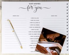 a baby's birth wish list with a pen