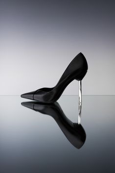 Divine minimalism is revealed by Sloane Sq elegant stiletto pump. Our beautiful sole is underset by our feature heel with a metal top piece, signature of the brand, in metallic silver. Refined elegance at its best. #lamaralondon #style #glamour #shoe #heels #party #fashion #chic #aesthetic Sleek Metallic Heels With Sculpted Heel, Elegant Metallic Synthetic Heels, Modern Metallic Heels In Metallic Leather, Luxury Modern Metallic Heels, Luxury Metallic Leather Heels, Melting Metal, Silver Pumps