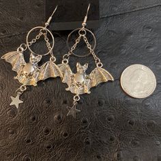 Silver Bat With Open Wings Earrings W/ Star Dangling Gothic Star-shaped Metal Earrings, Bat Wire Wrap, Bat Wing Earrings, Victorian Bat Jewelry, Silver Wing-shaped Earrings, Open Wings, Bat Earrings, Wing Earrings, Makeup Inspo