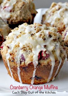 cranberry orange muffins on a white plate