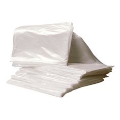 white plastic bags are stacked on top of each other