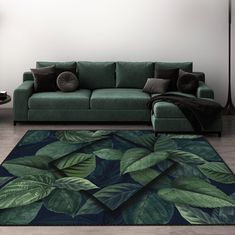 a living room with a green couch and large rug on the floor in front of it