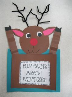 a reindeer with antlers on it's head is holding a sign that says fun places about reindeers