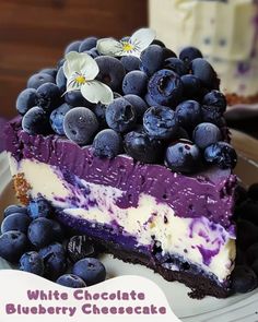 a slice of blueberry cheesecake on a plate