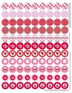 some type of stickers with hearts and numbers on them, all in different colors